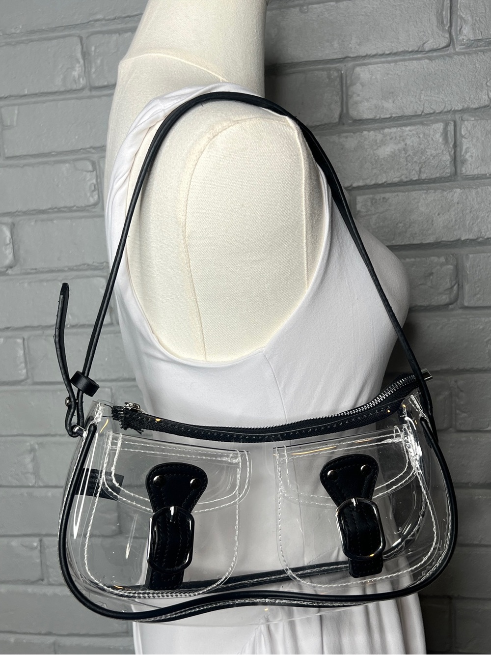 Transparent Shoulder Bag with Prominent Black Buckle Pocket Detailing